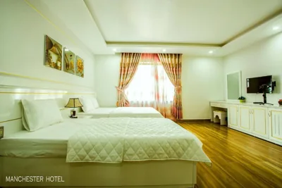 Chambre triple Deluxe avec vue sur la mer — Manchester Hotel Ha Long